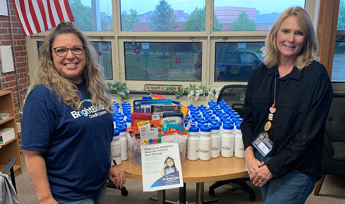 BrightBridge’s Hanover Branch Manager Carrie Lincoln (left) smiled with Principal Ellen Burns as she dropped off her branch’s donations to the Cedar Elementary School. 
