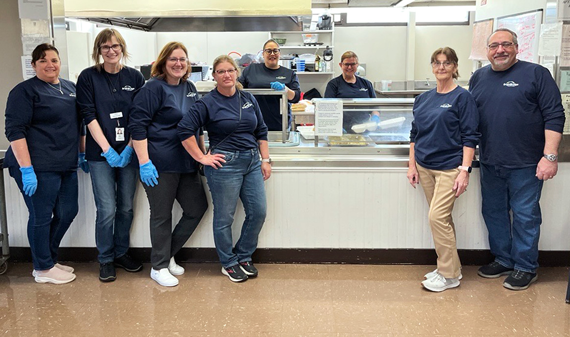 From left: Carmen Brasil, Karen Krisanda, Wendi Fallon, Tracy Mermet, Nancy Pierce, Suzanne Reid, Pamela Stamp and Anthony Marino.