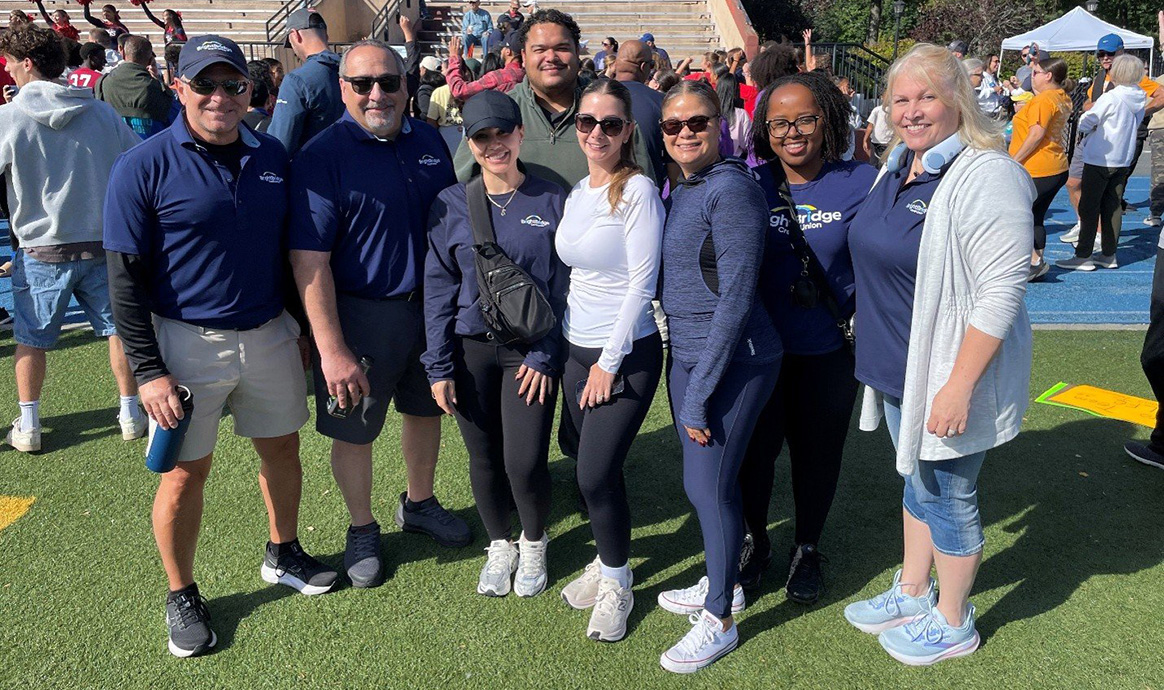 BrightBridge team members gathered at Veterans Memorial Stadium in Lawrence for the Lazarus House Ministries annual Walk for Hope.